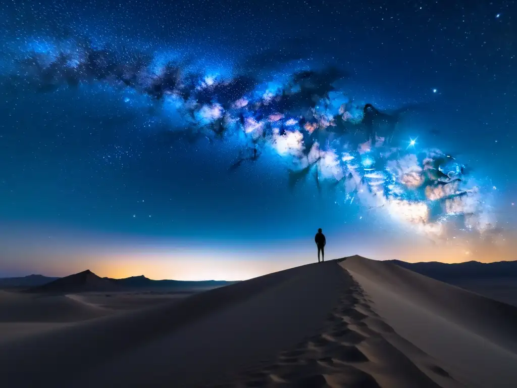 Una persona solitaria en un desierto bajo un cielo estrellado